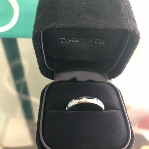 Tiffany Etoile platinum ring with diamonds.